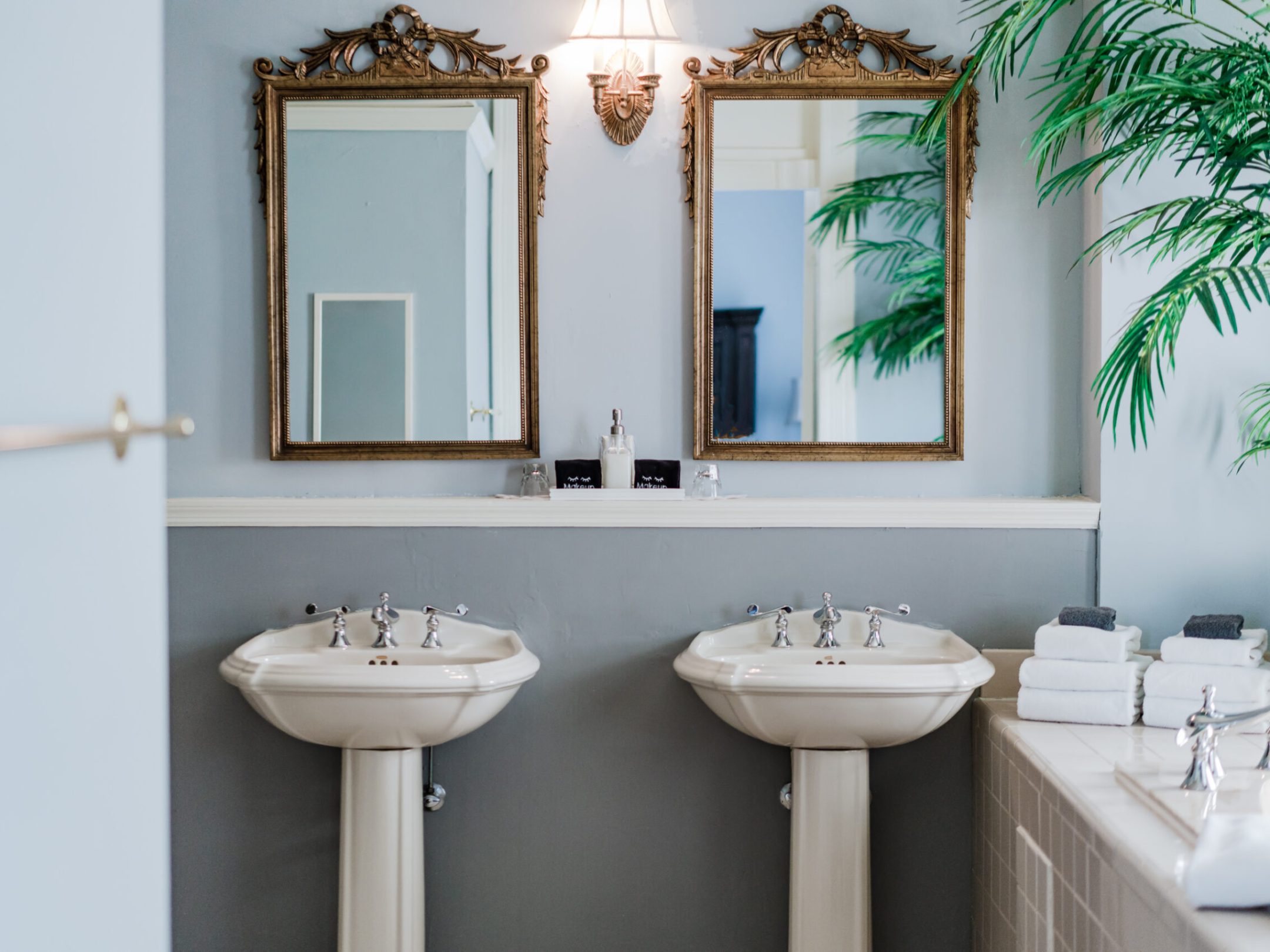 a restroom with a sink and a mirror