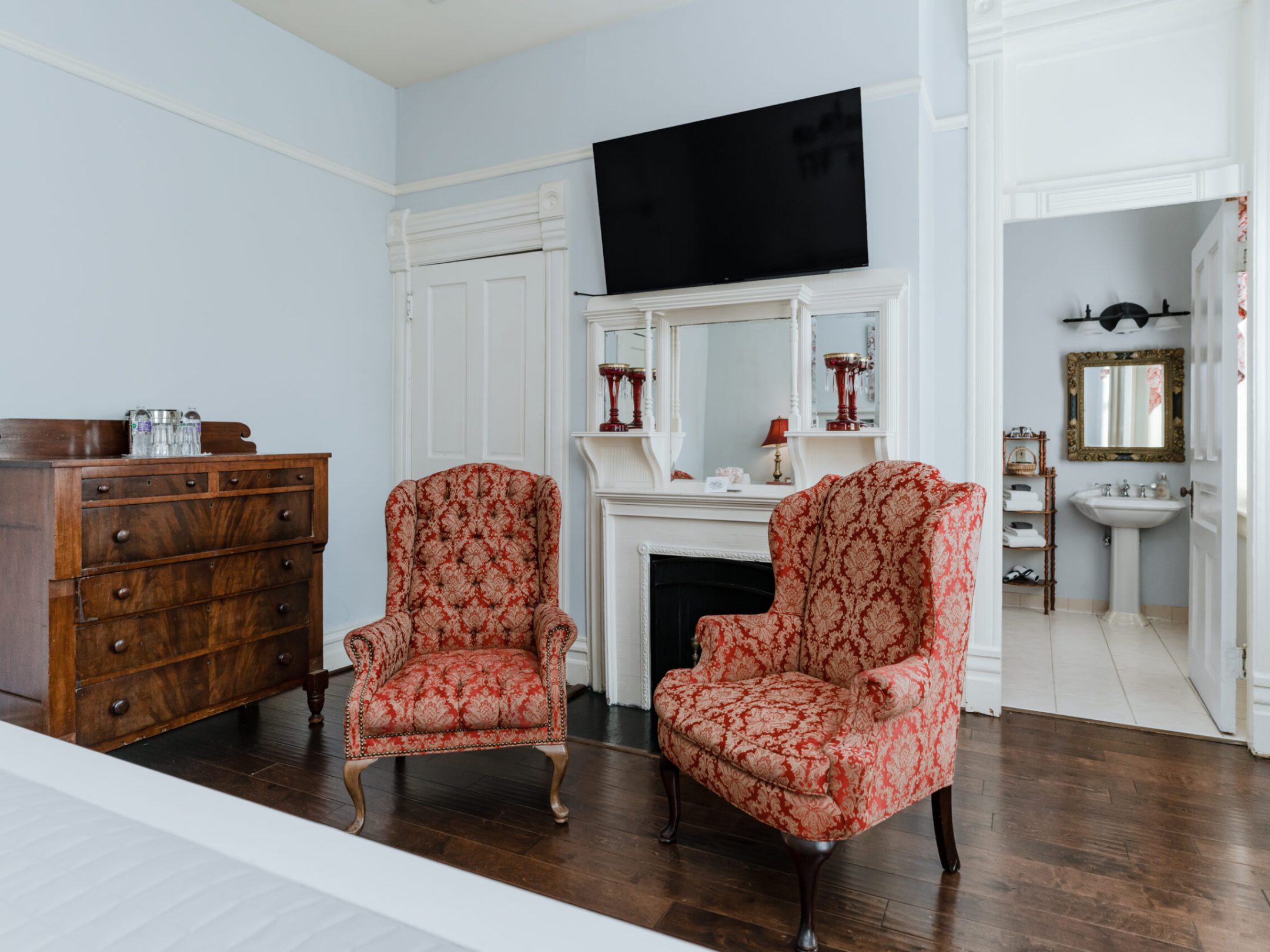 a living room filled with furniture and a fireplace