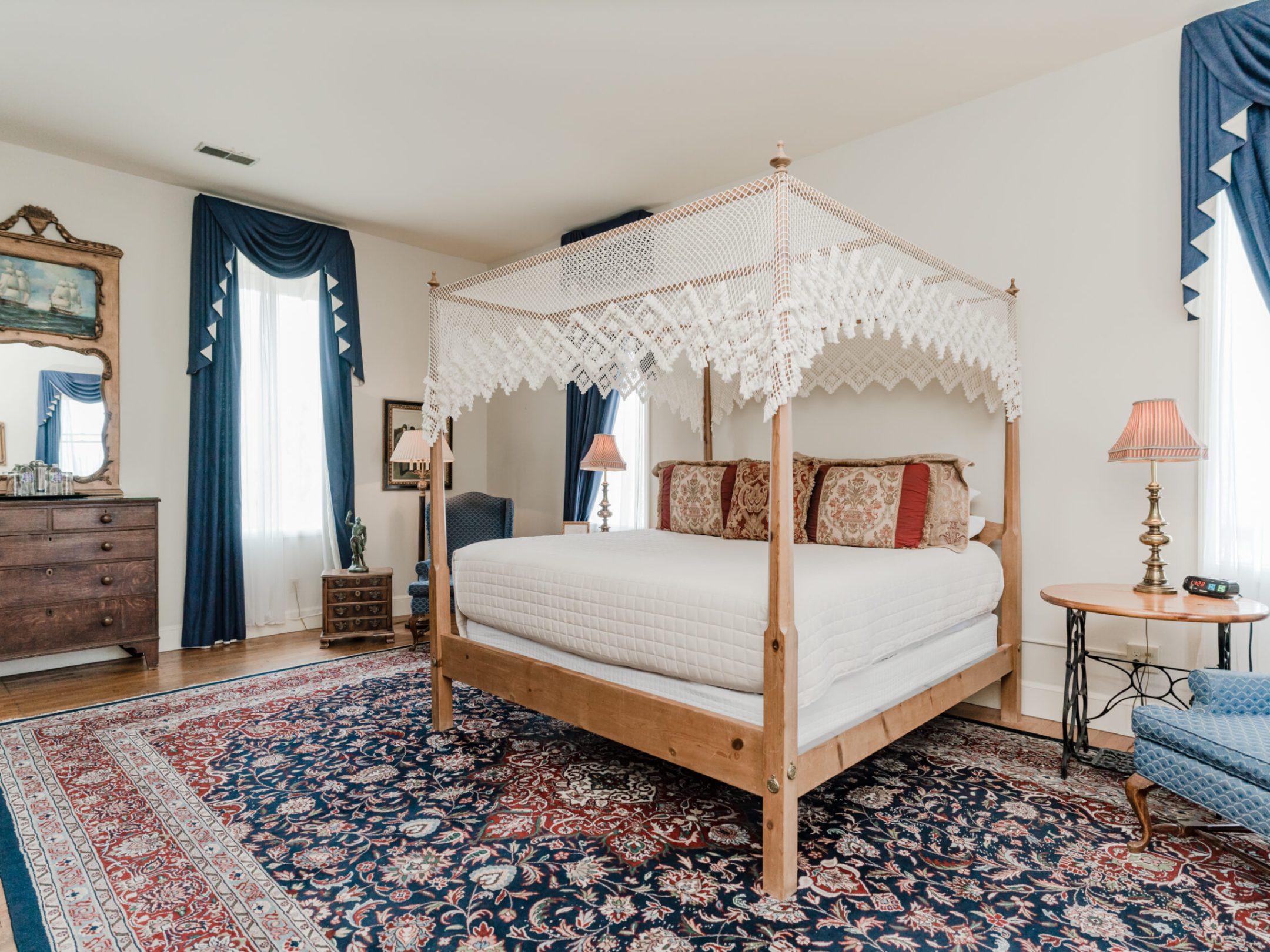 a bedroom with a bed in a room