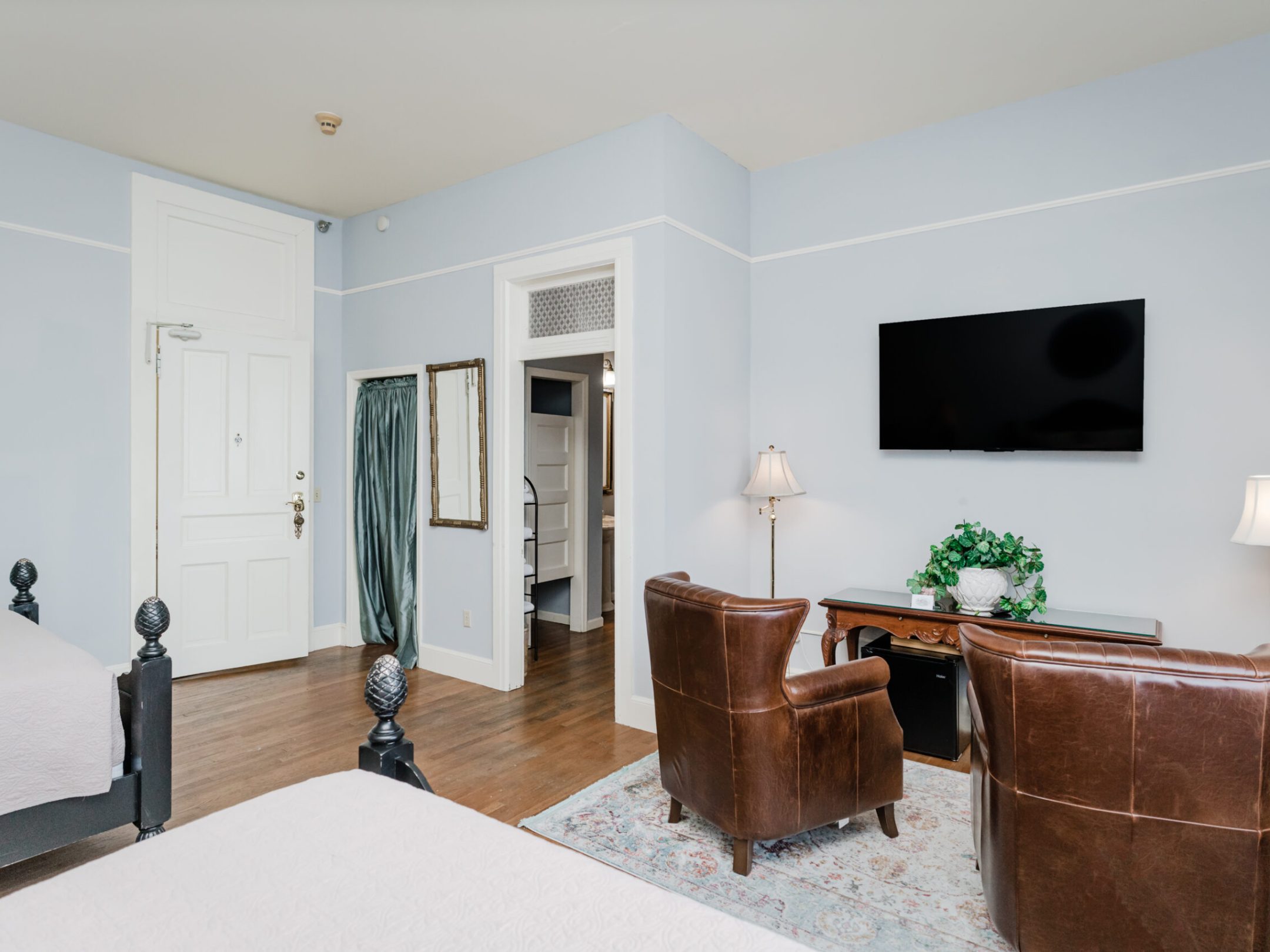 a living room filled with furniture and a fireplace