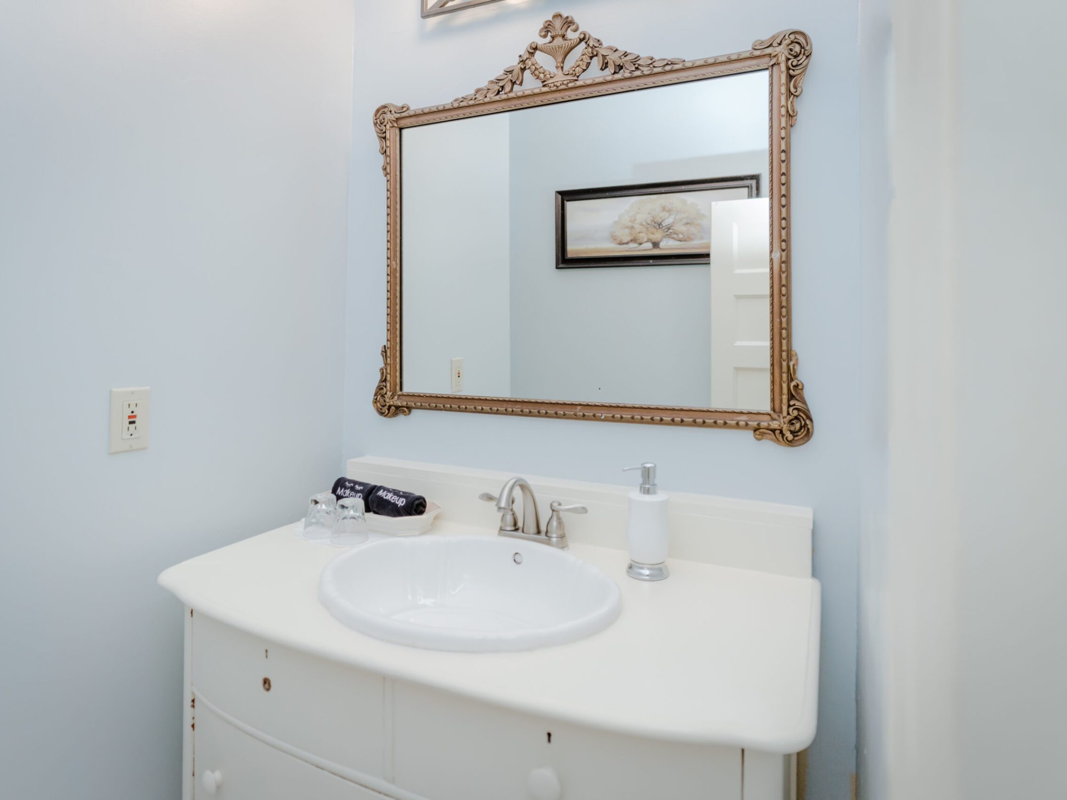 a sink and a mirror