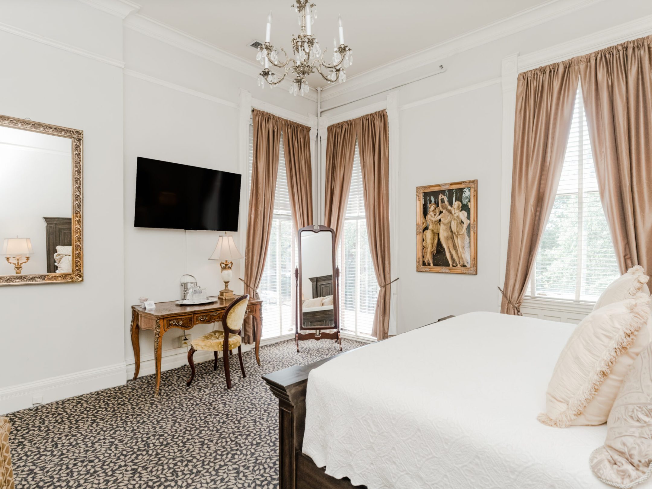 a bedroom with a bed in a room