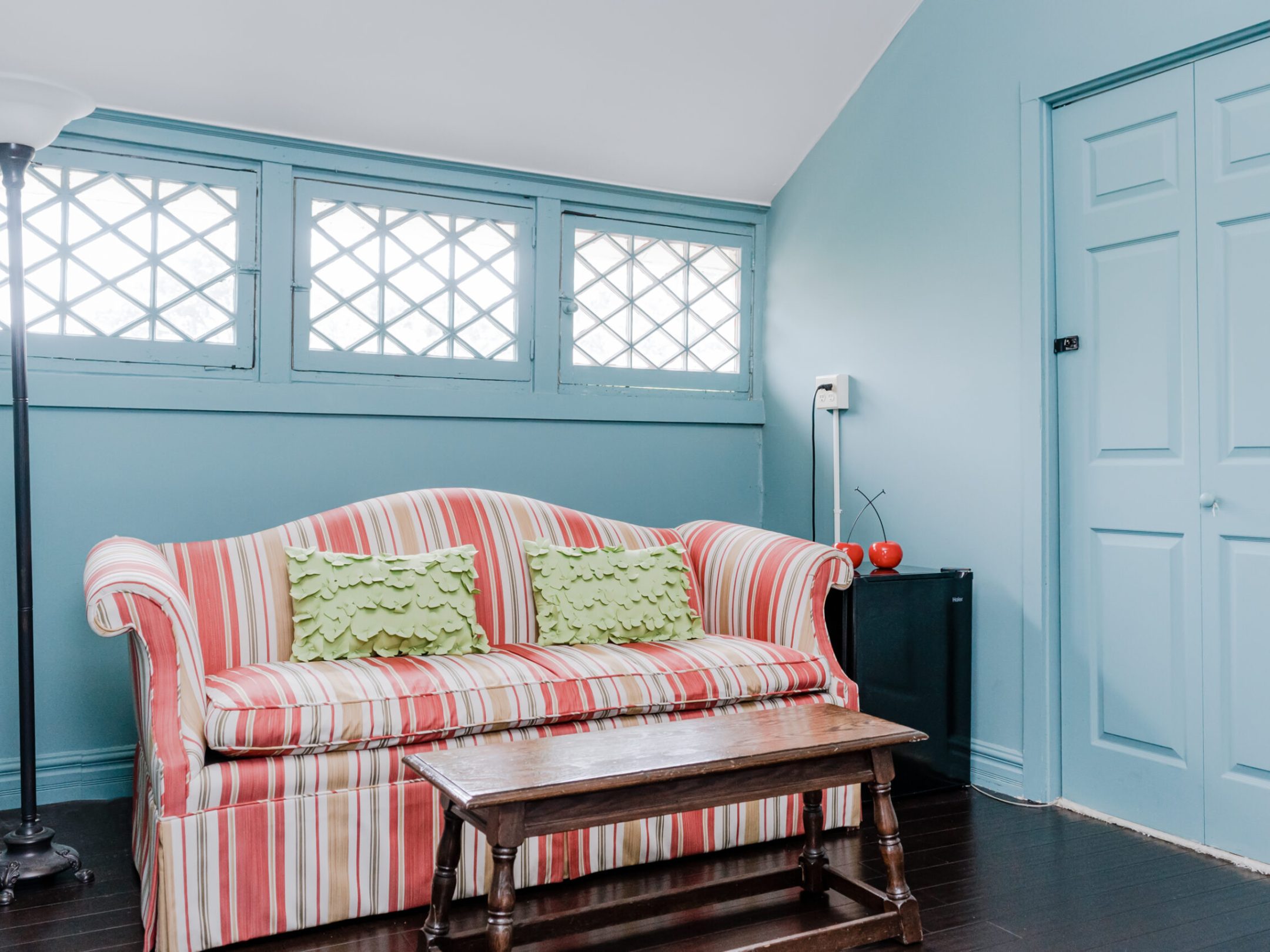 a bedroom with a bed in a room