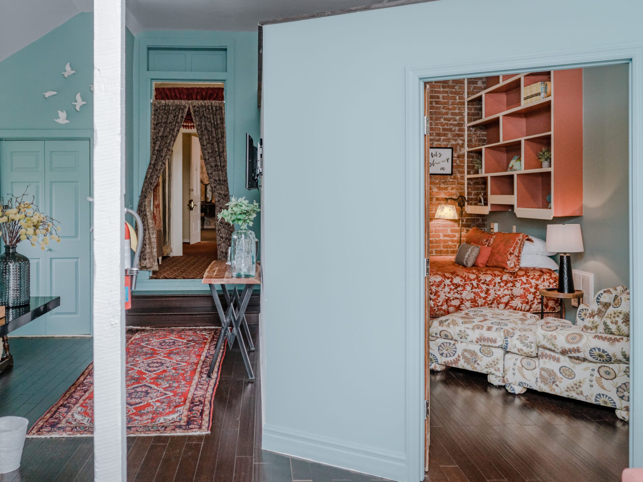 a room filled with furniture and a fireplace