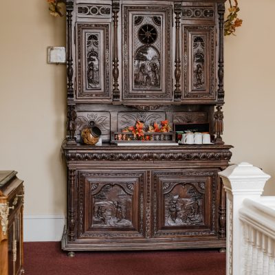 a room filled with furniture and a fireplace