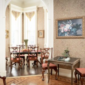 a living room filled with furniture and a fireplace