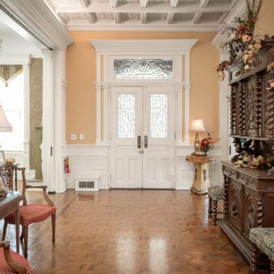 a living room filled with furniture and a fire place