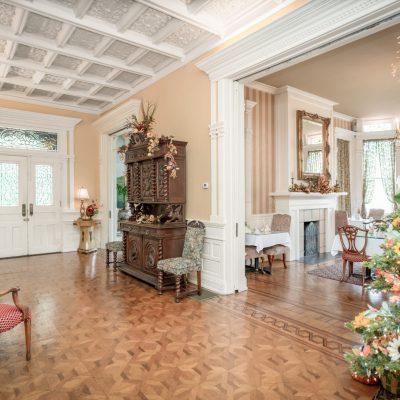 a living room filled with furniture and a fire place