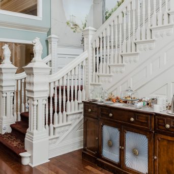 a room filled with furniture and a large window