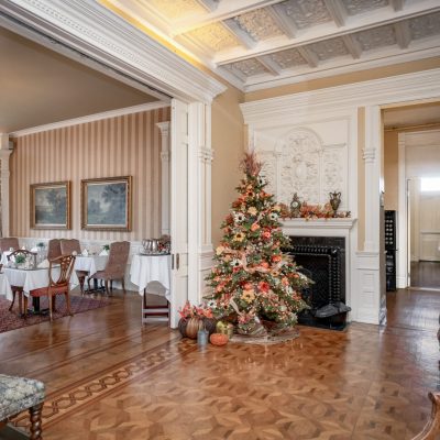 a living room filled with furniture and a fire place