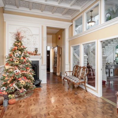 a living room filled with furniture and a large window