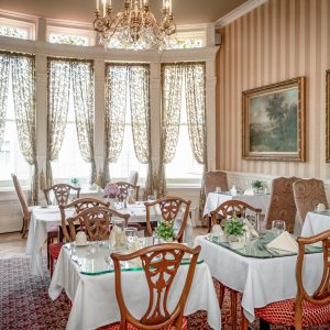 a living room filled with furniture and a fire place