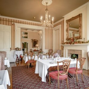 a living room filled with furniture and a fireplace